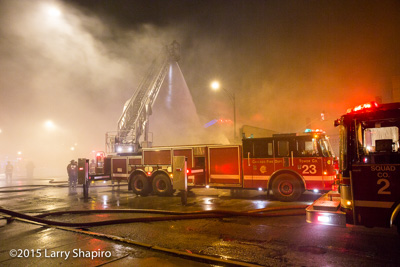 Chicago firefighters battle a commercial building fire at 5130 W Fulerton Ave 4-4-16 Larry Shapiro photographer shapirophotography.net E-ONE HP100 tower ladder